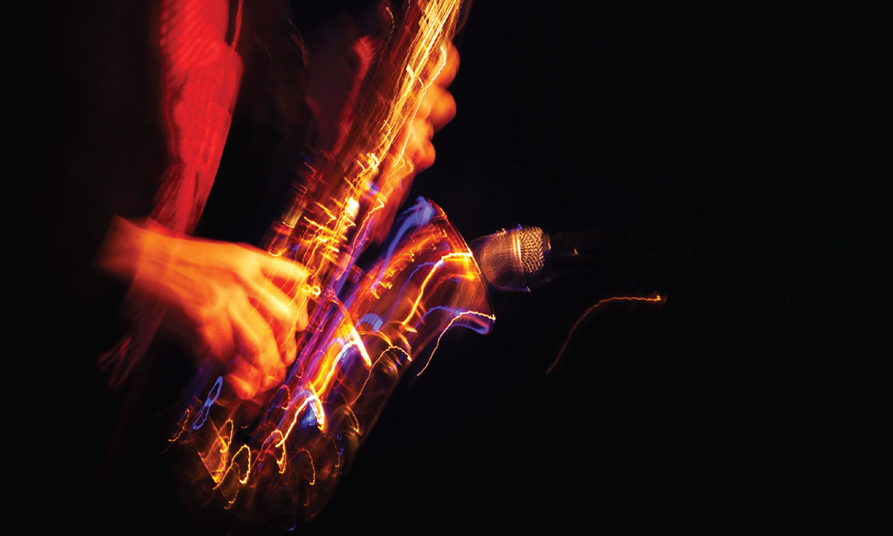 Jazz musicians hands on a saxophone