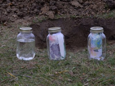 Jars on ground with contents