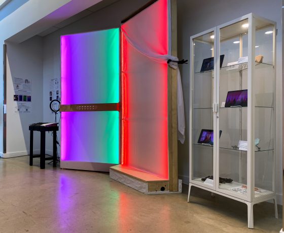 Photo of Why Don't We Together installation: LED-illuminated screen and keyboard.