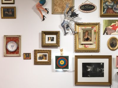 group of ornate framed artwork on wall