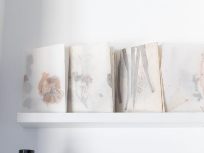art installation of painted pages