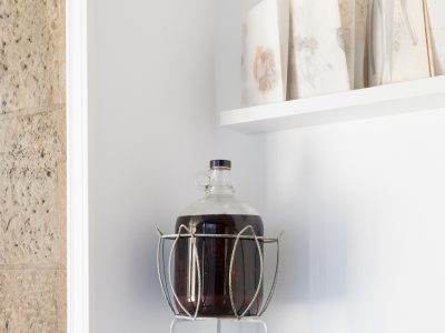 art installation of wine in a wine holder