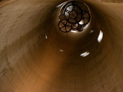 interior view of a silo with vintage gears