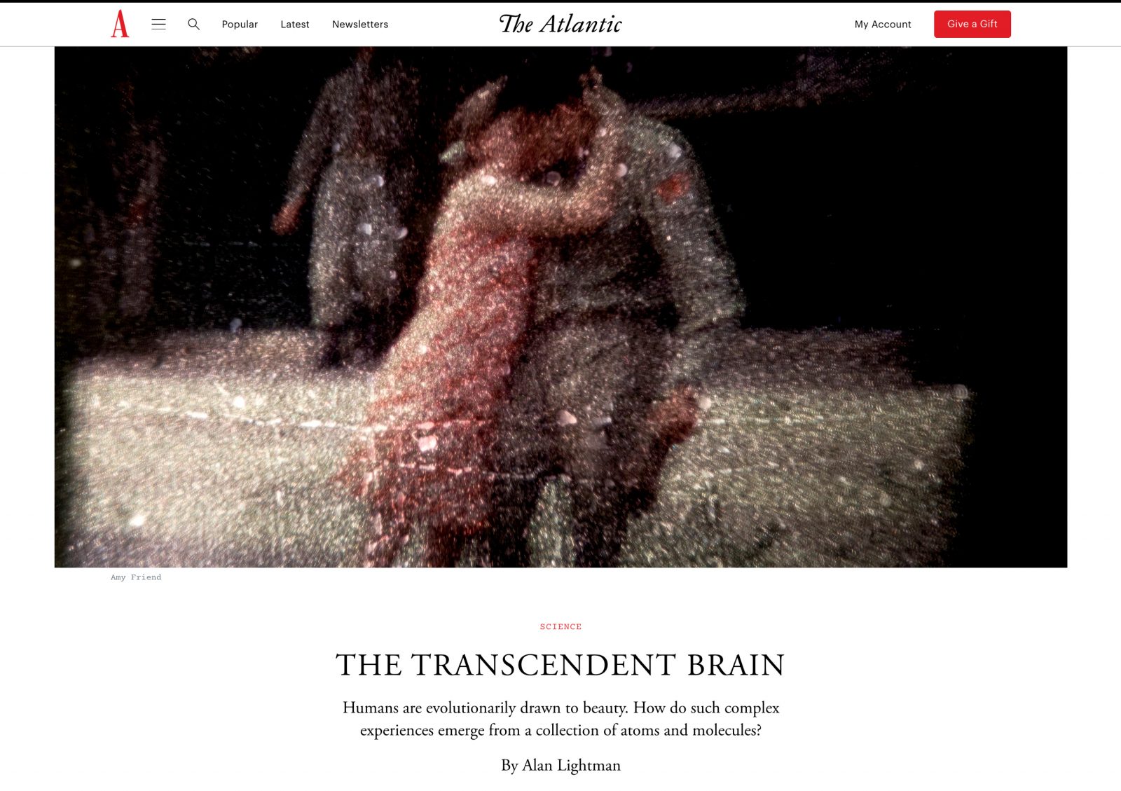 4. A screenshot of The Atlantic website featuring a patina image of a man and woman kissing.
