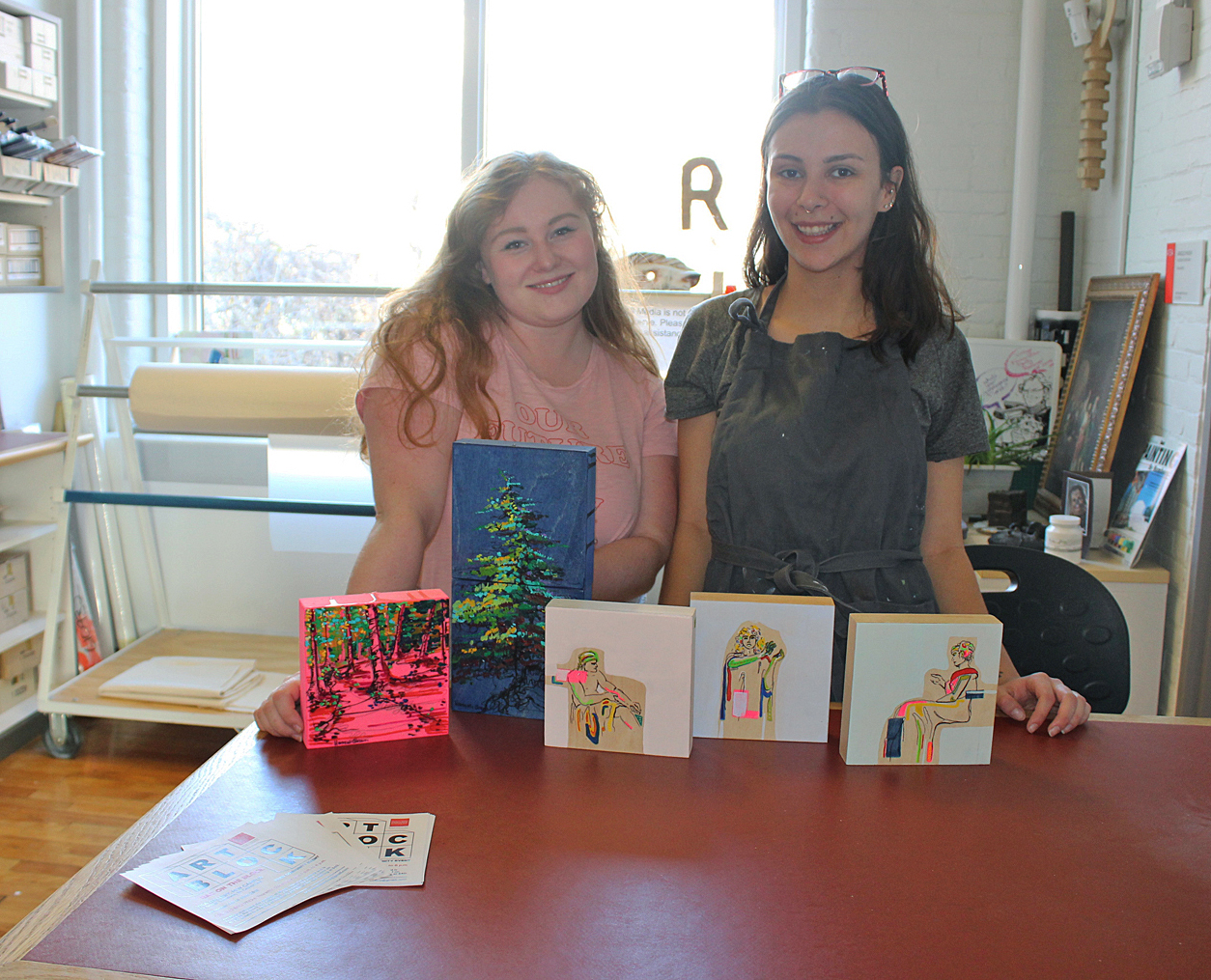 Sarah Martin and Syerra Jasmin showcase examples of artwork