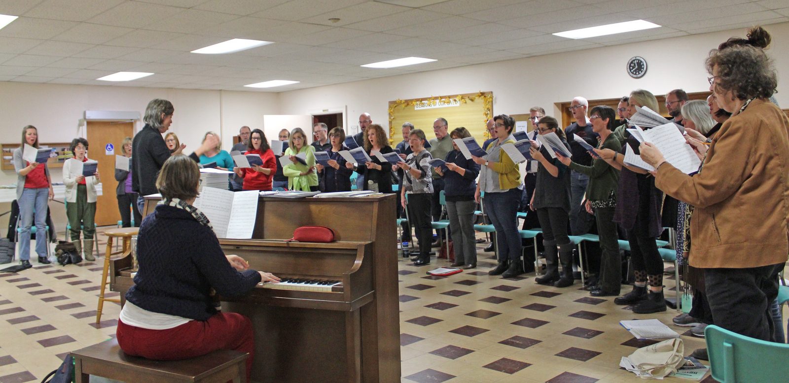 The Avanti Chamber Singers are led by Rachel Rensink-Hoff during choir rehearsal.