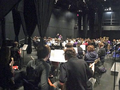musicians rehearsing on stage