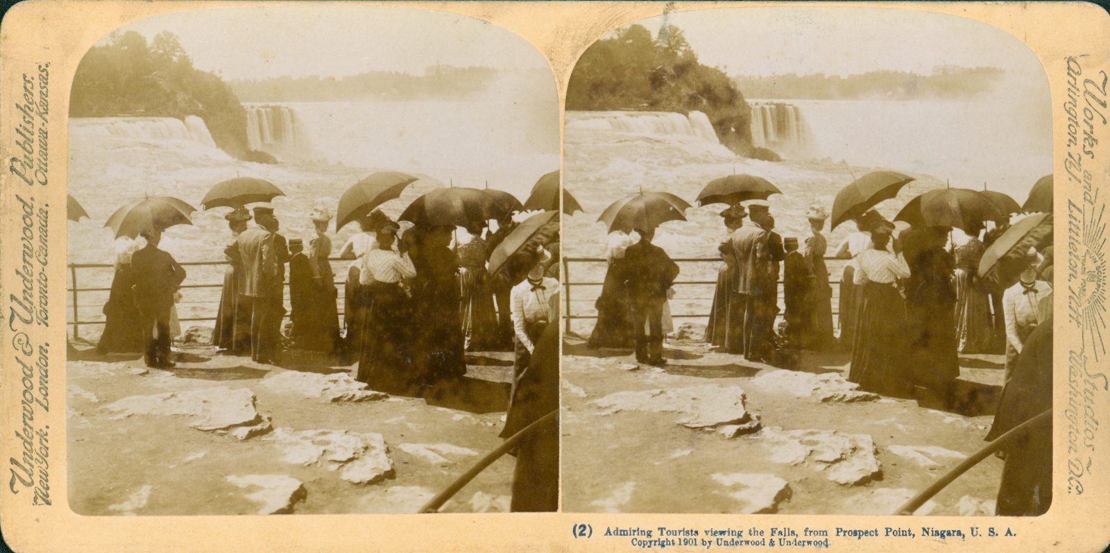 19th century Niagara falls visitors with umbrellas