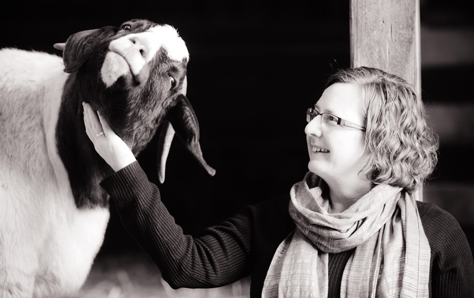 Keri Cronin petting a cow