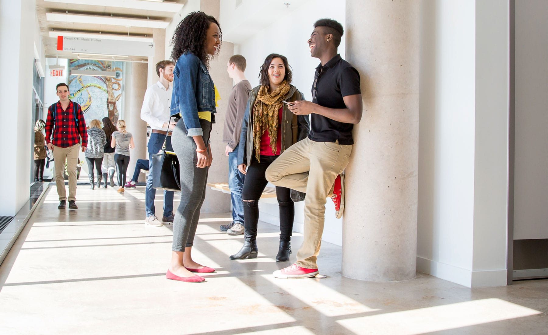 Group of students hanging out in Marilyn I. Walker hallway