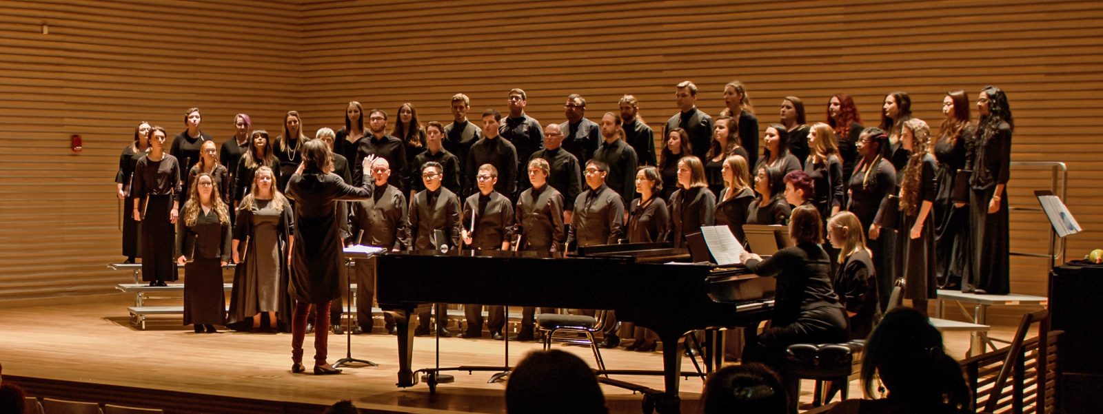 New Women’s Choir performing on stage