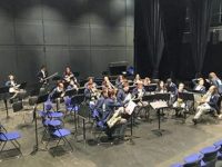 musicians rehearsing on stage