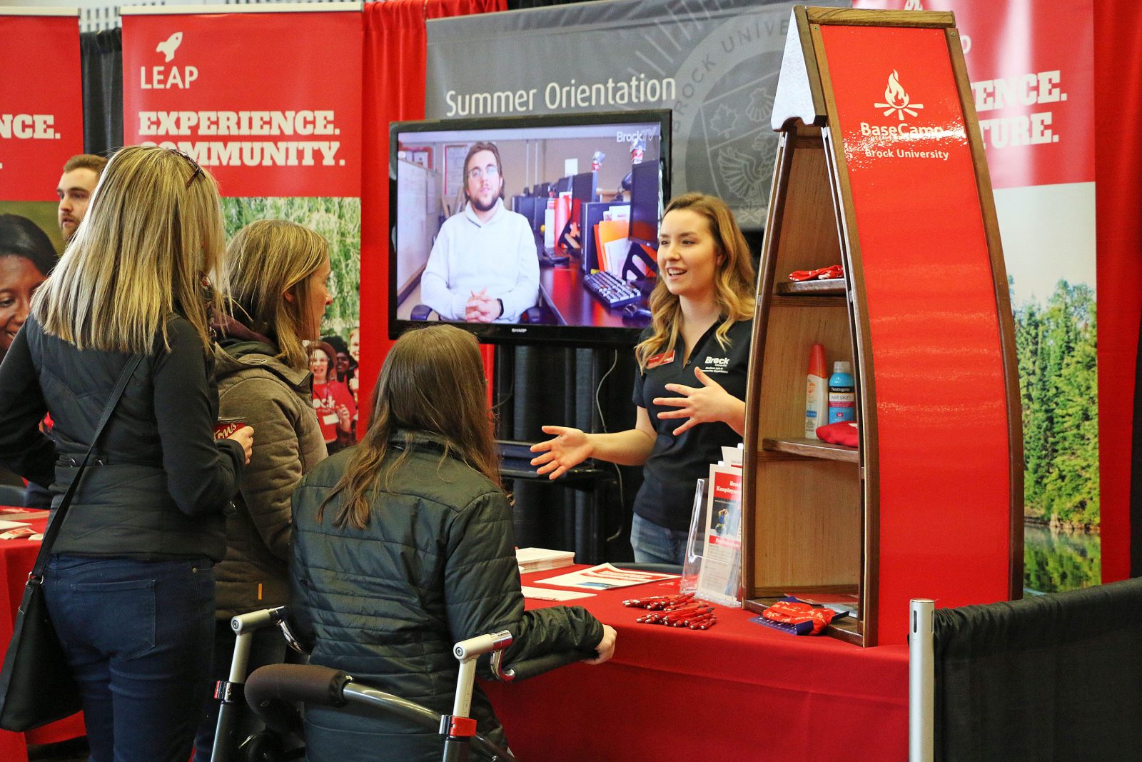 Students at Brock University open house booth