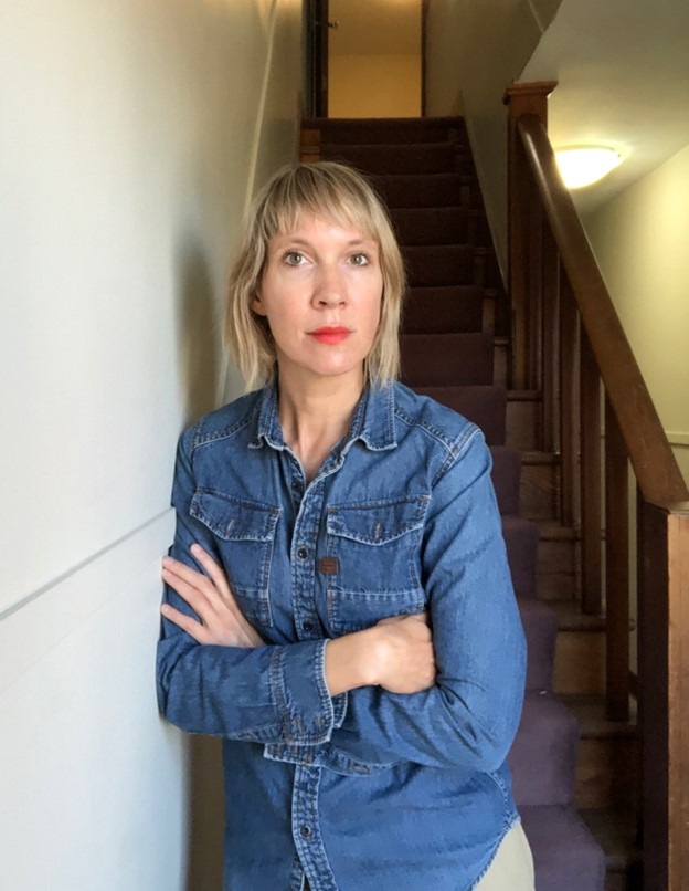 blonde woman in a jean shirt