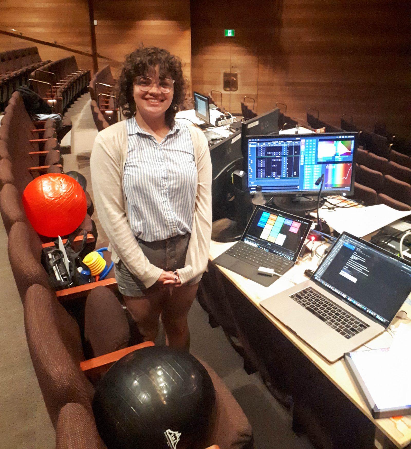 Brock Dramatic Arts student Mae Smith in control booth