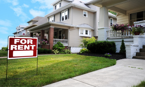A For Rent sign in front of home