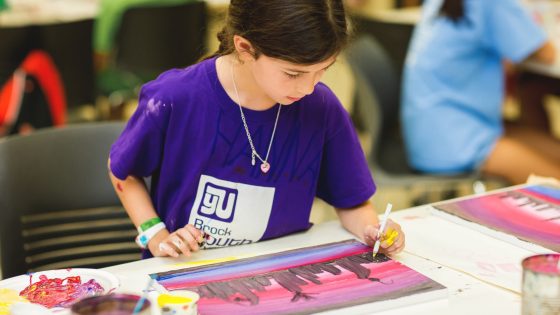 Child creating artwork