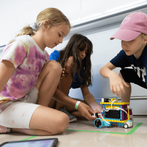 Children working on a robot