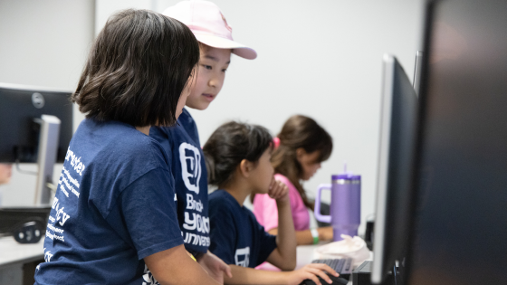 Tech Club-560x315 two children working on computer at Brock university