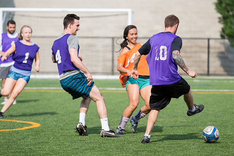 students playing intramural soccer