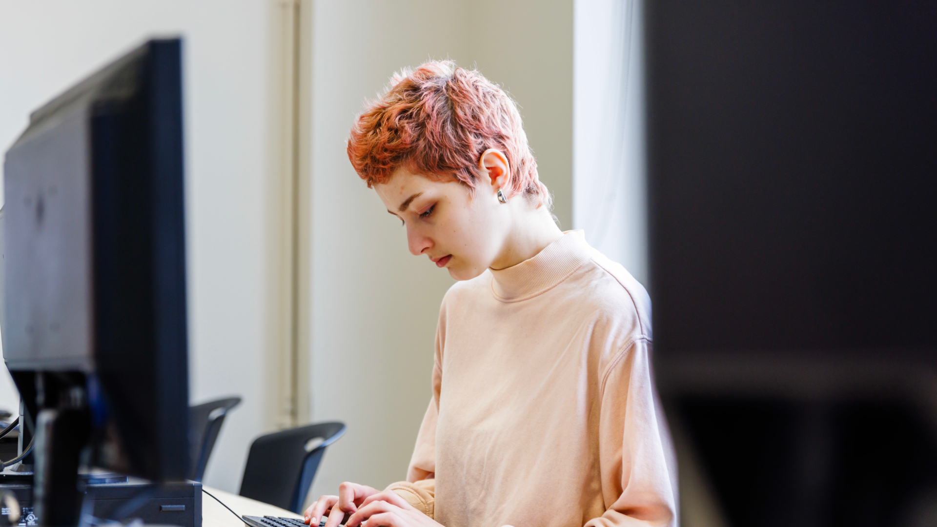 A student working at a computer 