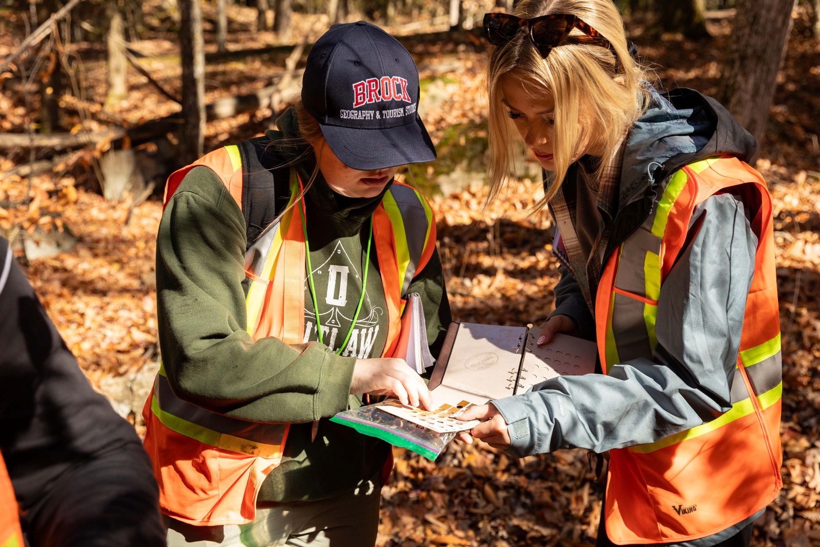 Sydney Westbury and Illiana Schlechta analyze soil samples