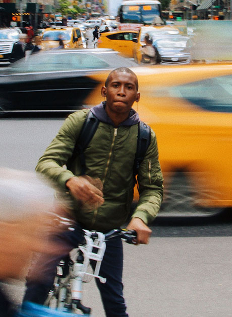 bike courier on busy street