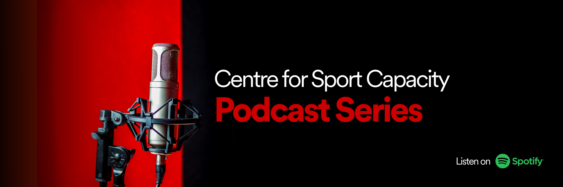 Podcast microphone on red and black background