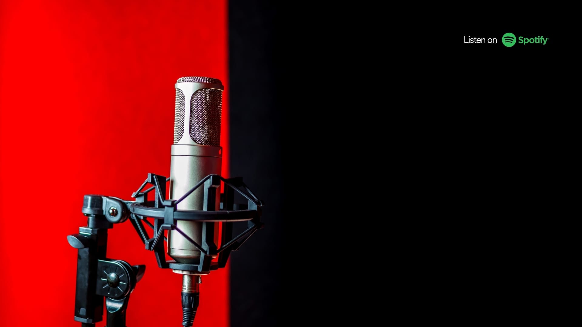Podcast microphone on red and black background 