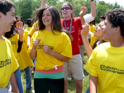 Group of teens jumping with excitement